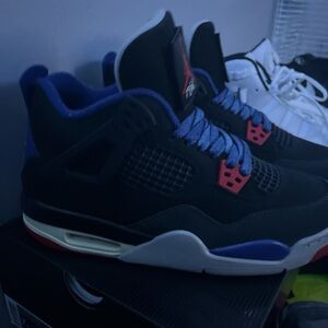 Jordan Men's Black and Red Sneakers with Blue Accents
